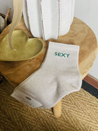Chaussettes pailletées à message